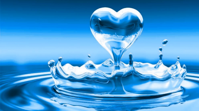 A Droplet Of Water Shaped Like A Heart With Ripples Below